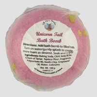 Pink bath bomb with a label on a white background