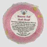 Pink bath bomb with a label on a white background