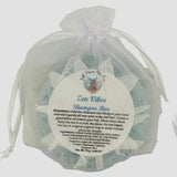 Full Moon Gardens concentrated solid Shampoo/body wash bar in a white organza with a label on a light gray background
